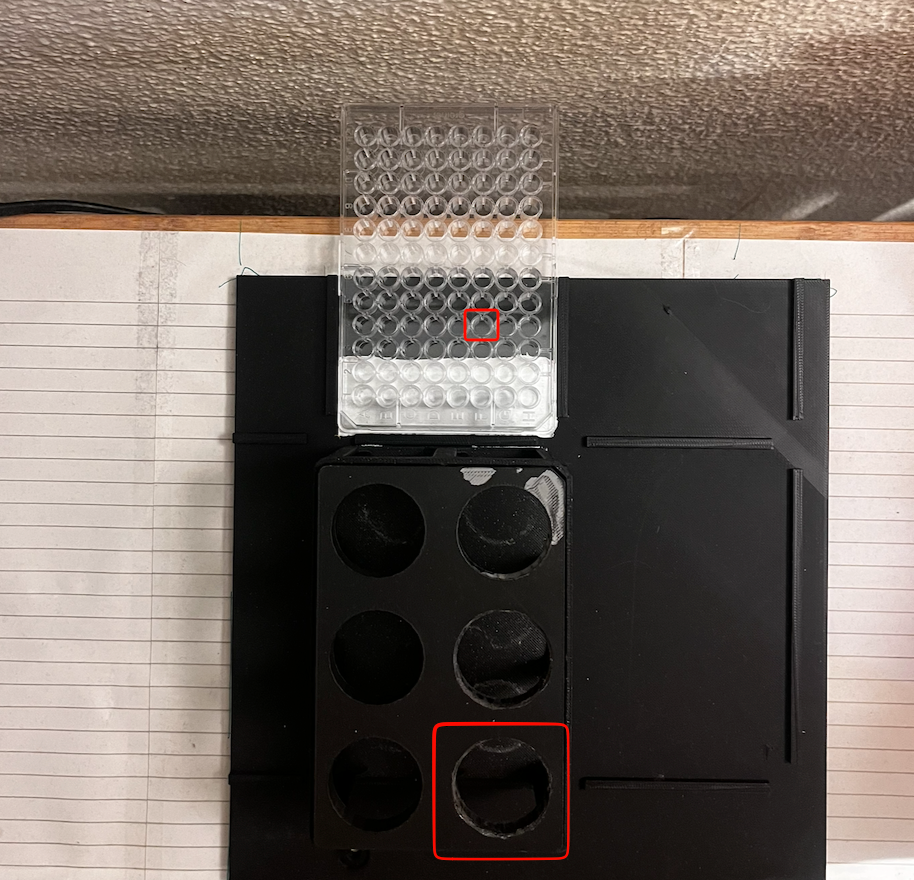 Top view of the task: tube start region and target hole